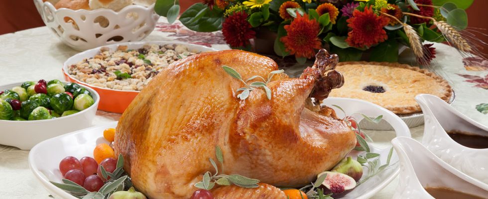 thanksgiving turkey on table with sides